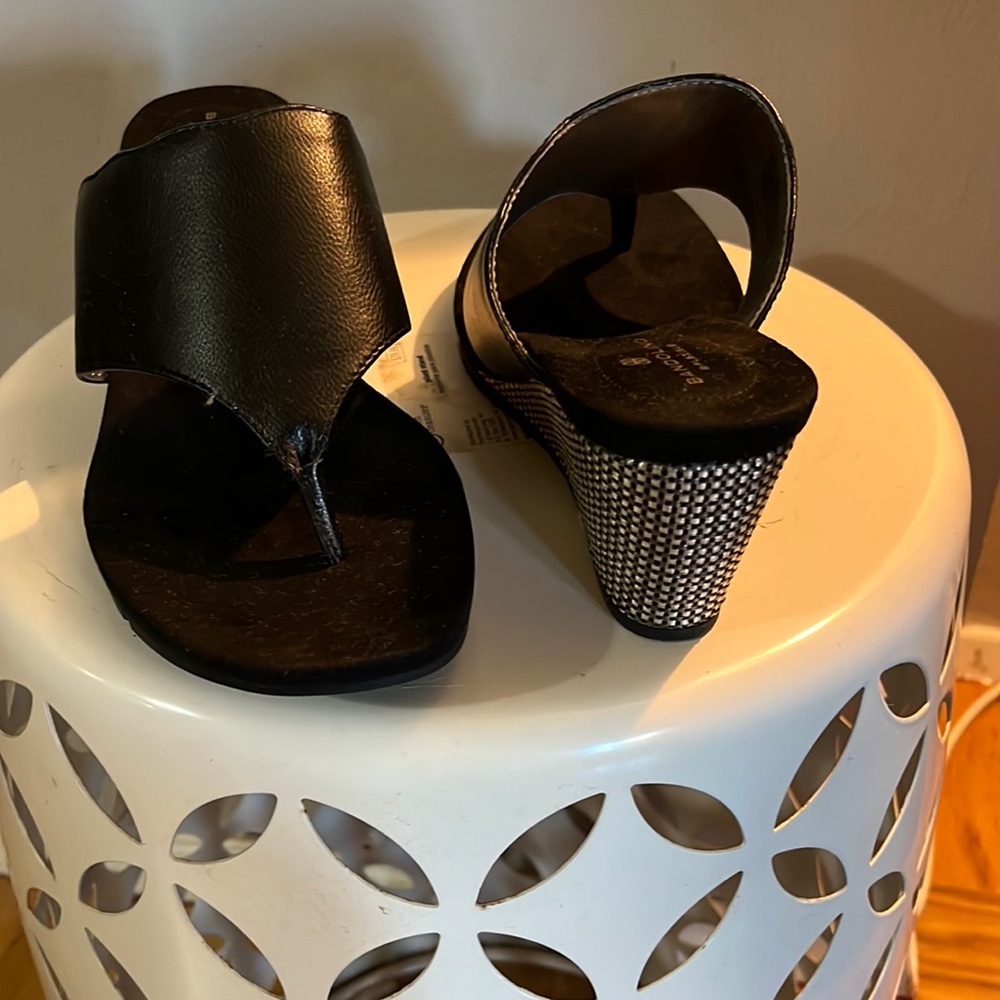 Black sandals.
